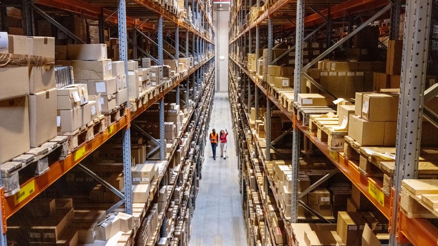 workers in a large warehouse