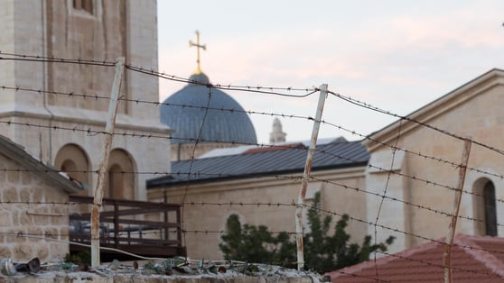 Church behind barbed wire fence in Israel