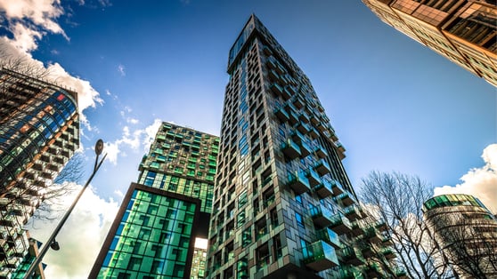 Green buildings with protruding windows 